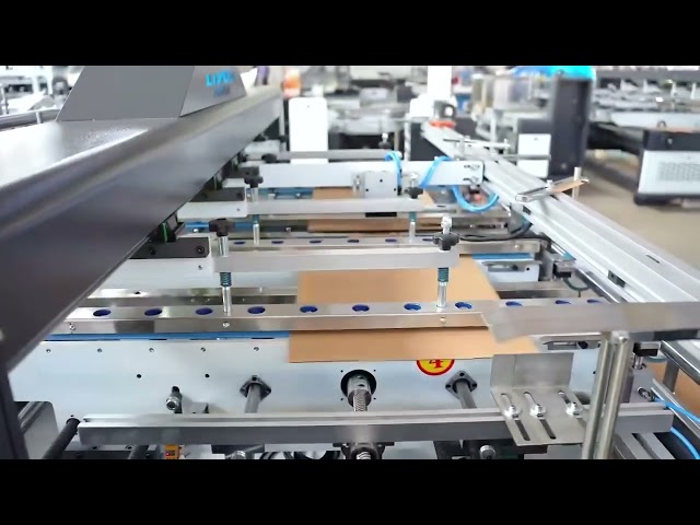 Corrugated carton box folder gluer machine