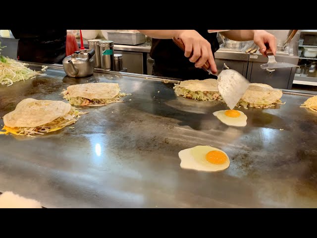 Tabletop Cooking Oknomiyaki Restaurant in Japan