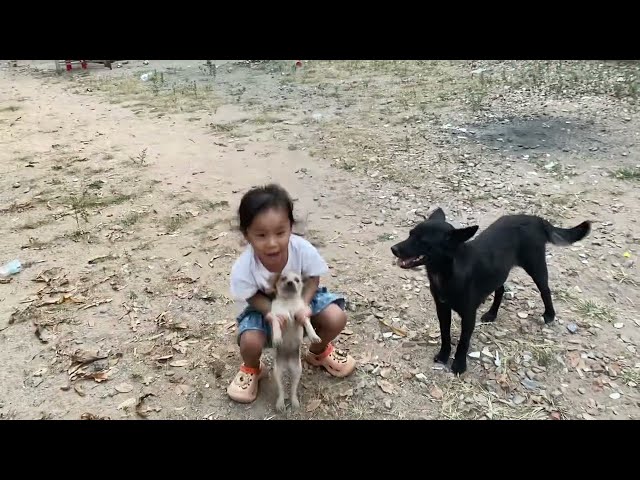 Such beautiful kids lovely dog,FINO smiles to kid