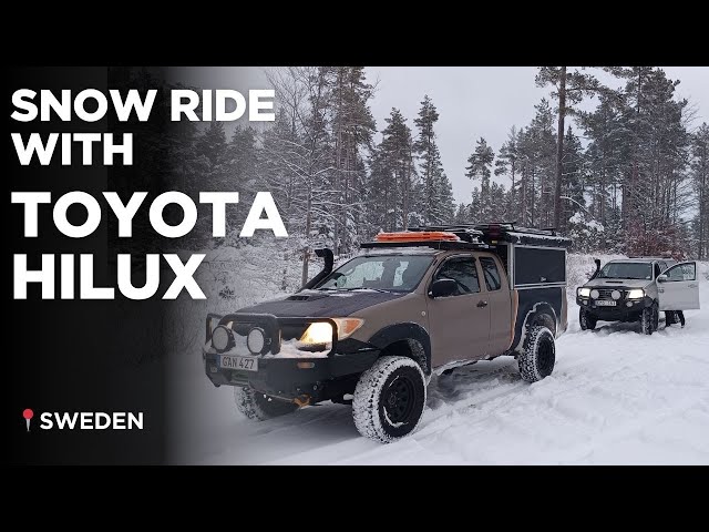 Two Toyota Hiluxes on Snow in Sweden