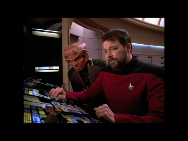 Riker explaining to the ferengi how to use the computer