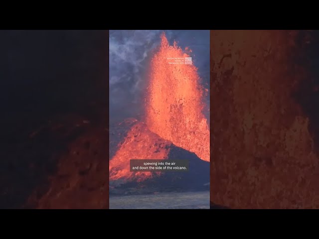 Tourists Watch Kilauea Volcano Spew Orange Lava Into The Air