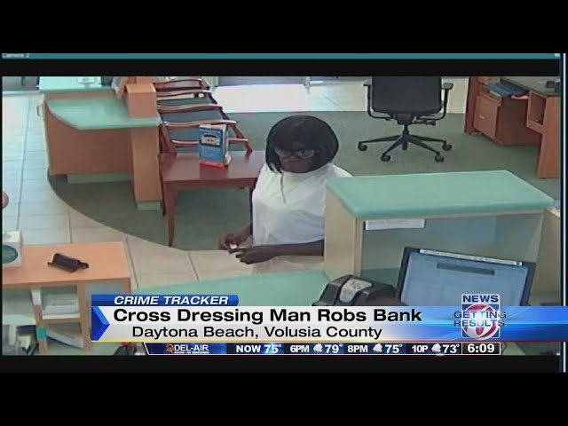 Cross-dressing man sought in bank robbery