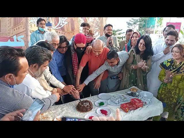 Actor Javed Sheikh and Dr J Paul Fazil Jamili cut the Holi cake at Karachi Press Club