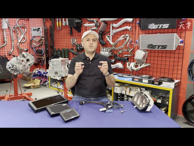 Fadi shows off the MoTeC dash display plug and play kit for EVO 7-9