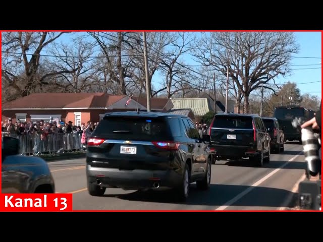 Jimmy Carter's funeral procession drives by Plains, Georgia as crowd gathers to pay respects