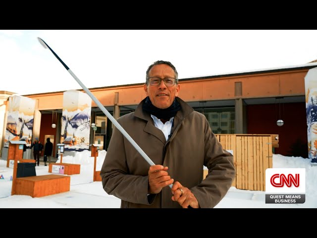 Richard Quest Learns About Upcoming Global Challenges over a Round of Ice Hockey Mini Golf