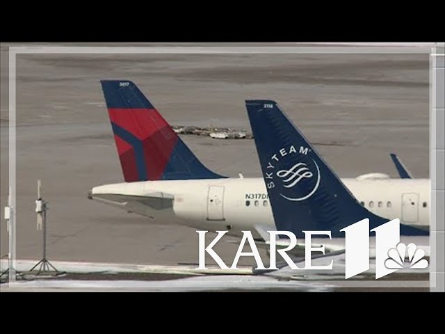 Delta planes clip wings at MSP