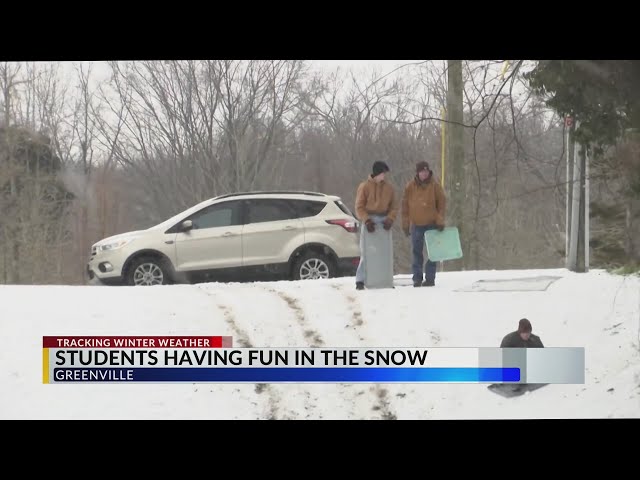 ECU students make most of snow day by having fun sledding