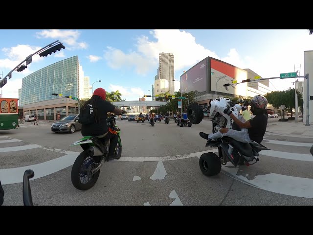 Riding Hypertoyz Electric scooter with Dirtbikes Downtown Miami