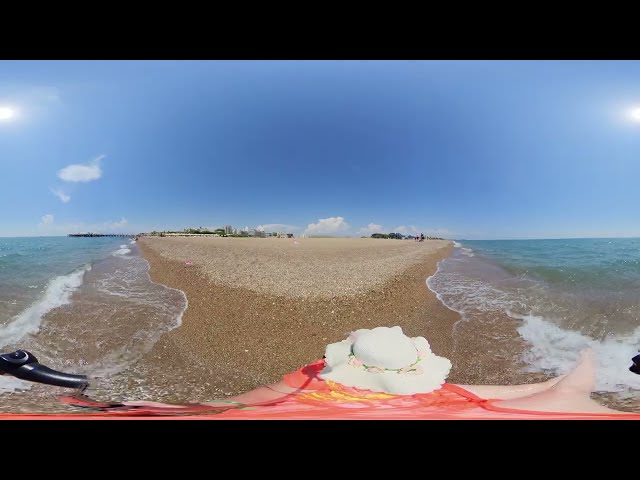 Relaxation on the shore. Sea waves. 360video