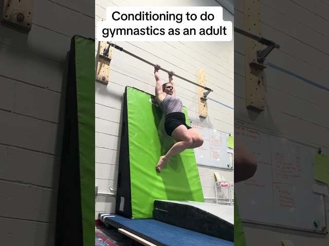 Gymnast is doing conditioning to build strength!