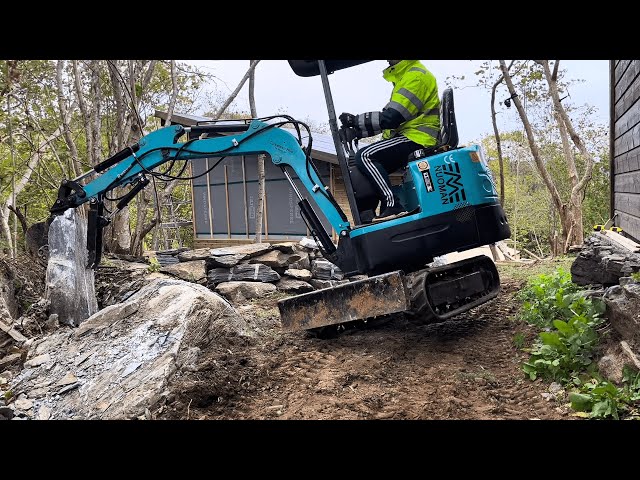 Making a stone-wall and a walkway with the mini-excavator