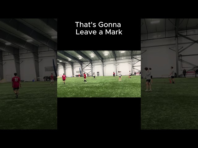 Kid gets sniped by a soccer ball