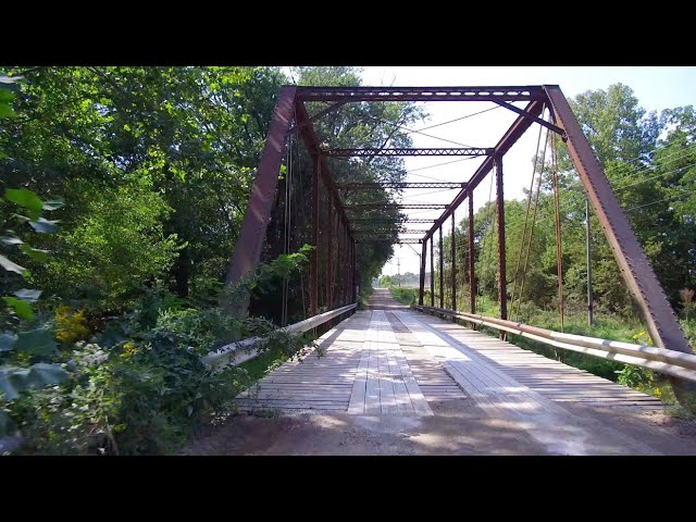 Covered Bridge Destroyed by Tornado, Replaced by Steel Bridge Which Was Divided into Smaller Bridges