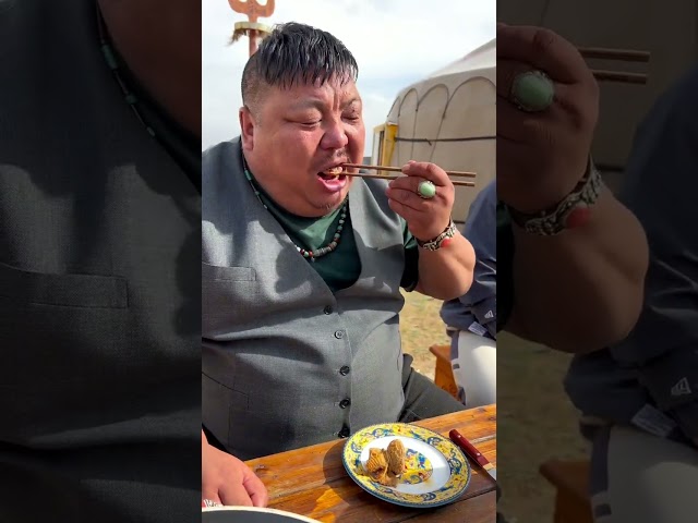 Enke eating spicy pork belly outdoors! #camping #cooking #village #mongolia