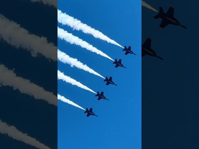 Blue Angles 1,2,3,4,5 in a loop maneuver.