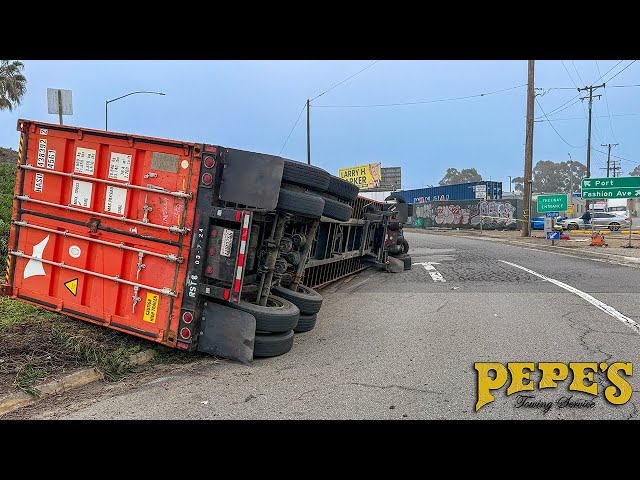 Semi Crashes Into Telephone Pole and Rolls Over