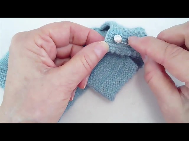 Sewing Buttons onto Knitting