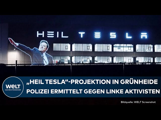 ELON MUSK: Linke Aktivisten projizieren "Heil Tesla" auf Gigafactory in Grünheide