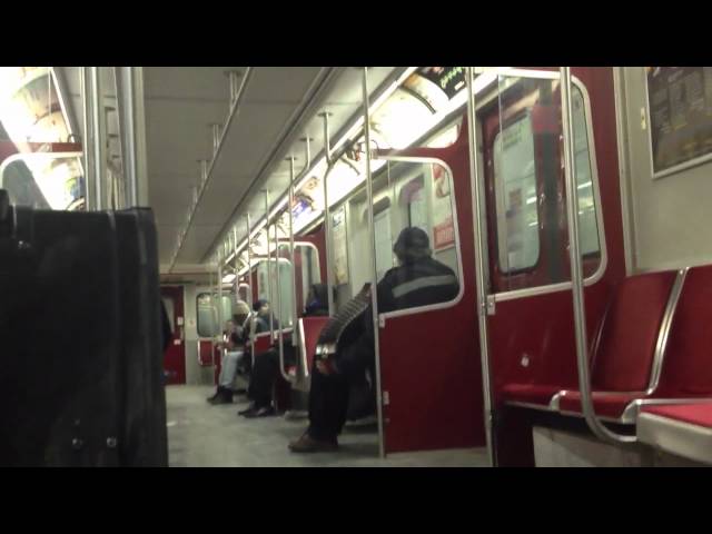 Funny Drunk singing old guy playing an accordion on the Subway in Toronto