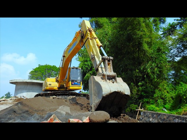 Komatsu PC200 Excavator Working On The Public Garden Construction