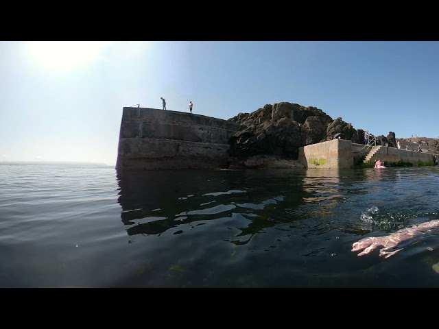 360 travel video. jumping/tombstoning in Portstewart harbour. Northern Ireland.