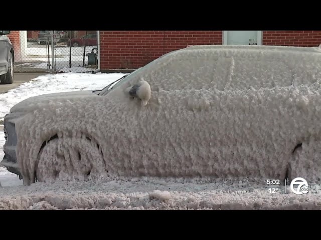 Water main break leaves cars covered in ice on Dearborn Heights street