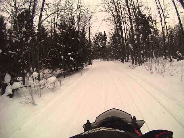 Snowmobiling on trail 13 south to root cellar on lake gogebic