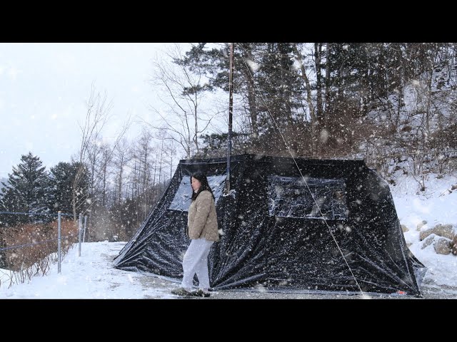 Solo camping❄️ I almost started a fire in my tent while using the wood stove.