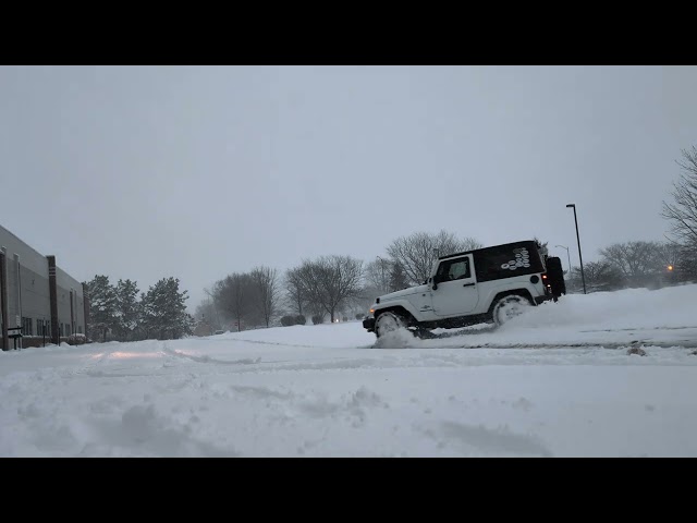 2014 Jeep Wrangler in Wisconsin Snow