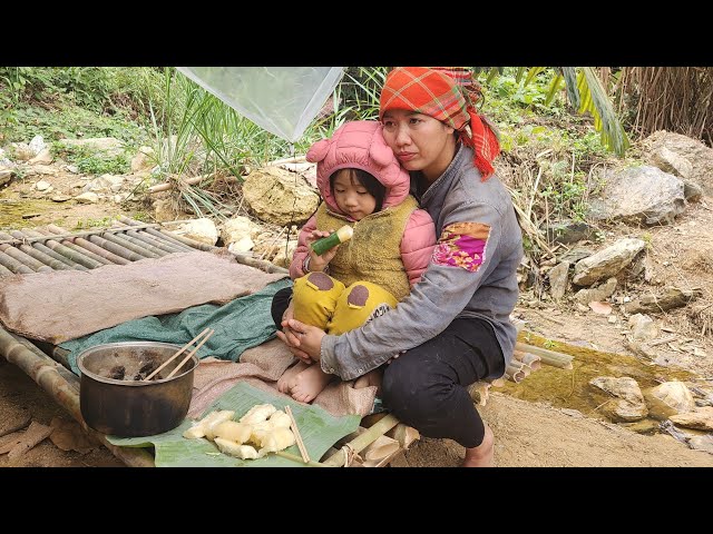 single mother and child living day by day in the forest