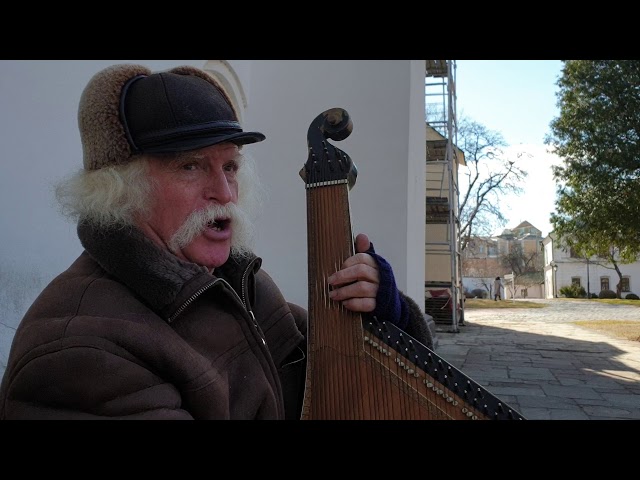 An old Cossack man sings a heartful Ukranian song in Kyiv, Ukraina