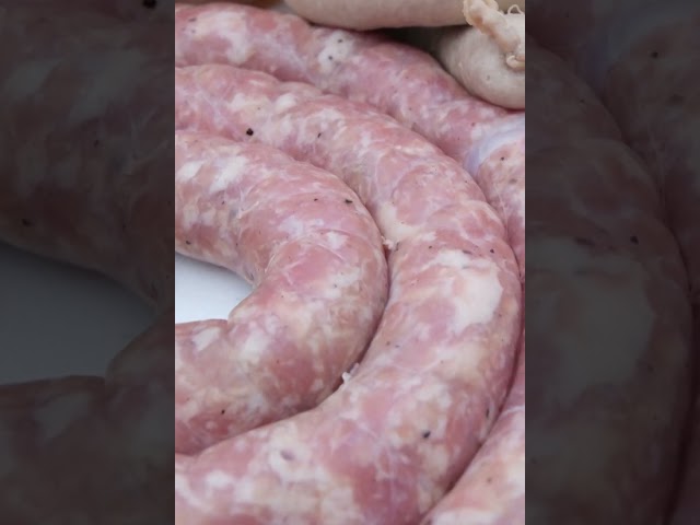 Extreme close up of freshly stuffed sausage rings #homecookingfm #smoker #sausage #polishfood #raw