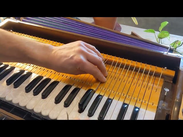 How to resolve a stuck (constantly sounding) note on a harmonium with an octave coupler