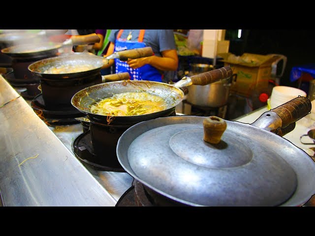 Thai Orchids & Street Food at a Fair in Thailand. Street Food Shopping at a Thai Market