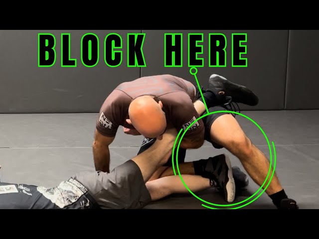 Leg lace wrestling move. Easiest way to set it up.