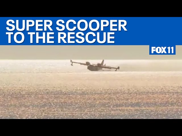 California Fires: Super Scooper picks up water to fight Palisades fire