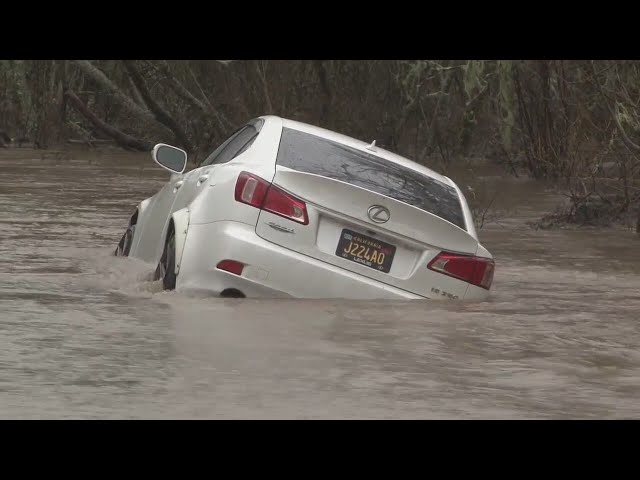 Car abandoned on flooded Marin County roadway