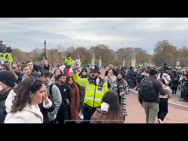 ROWDY CROWDS DELAY CHANGING OF THE GUARD