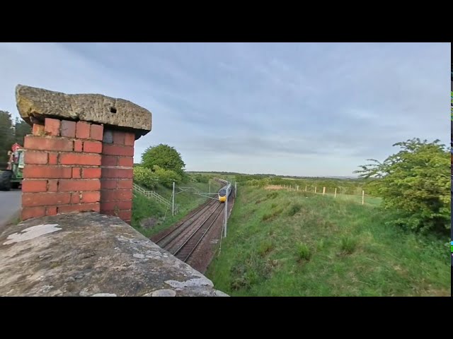 Carluke, Pendolino train on 20/05/26 at 2049 VR180