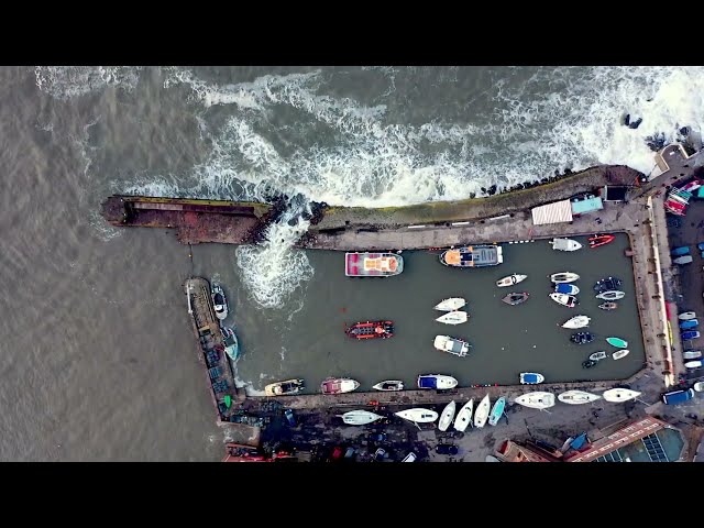 Storm Babet - breaching of North Berwick Harbour Wall