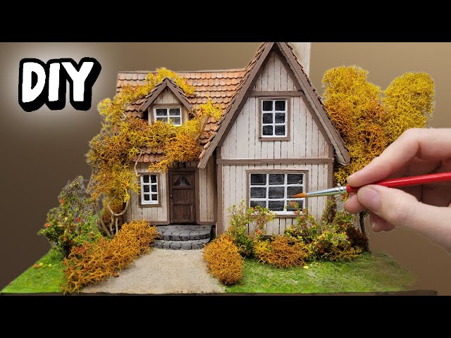 STOP throwing away cardboard! Instead, turn it into a cozy autumn house!