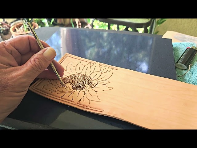 Advanced leather carving.  Adding seeds to sunflowers. Patio theropy session #1.