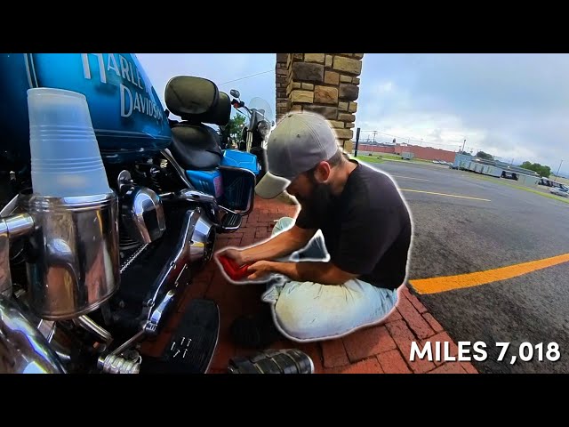 Motorcycle Maintenance in hotel parking lot Day 24 - miles 7,000