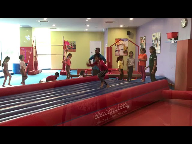 Lisha practicing gym flipping