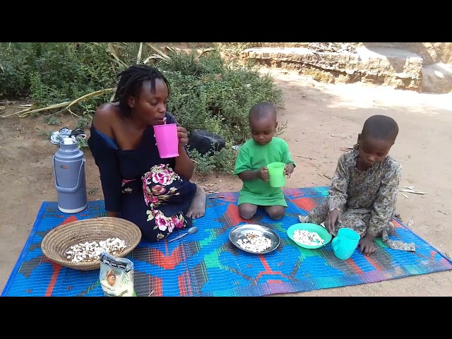 Daily lifestyle of Africa village mom with her children  African village life