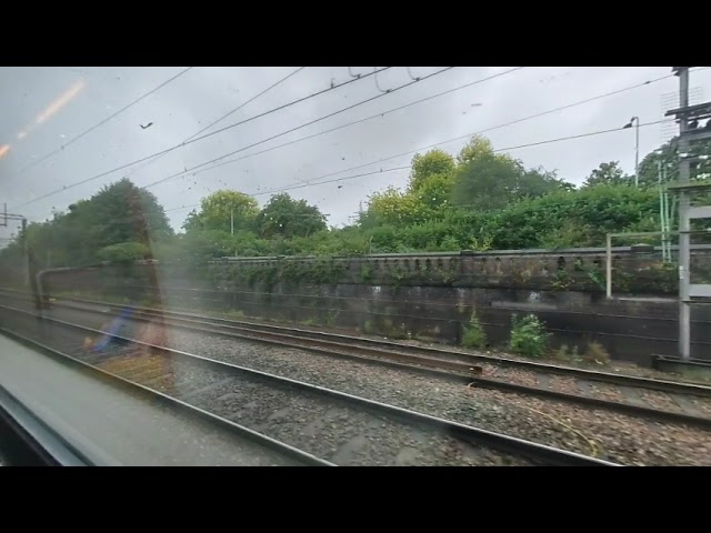 Pendolino train window view arriving at Crewe on 2021- 08-21 at 1124 in VR180