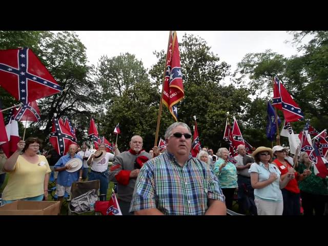 Confederate flag supporters sing I Wish I Was in Dixie