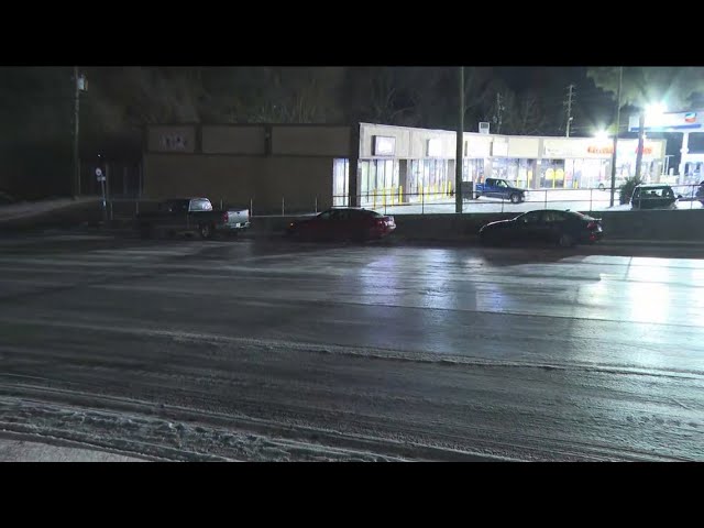 Cars abandoned on icy metro Atlanta roads following snow on Tuesday